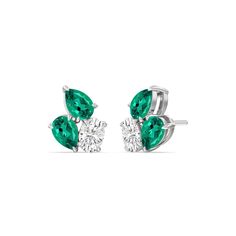 You won't regret treating yourself to this fuss-free wardrobe staple. These diamond and created emerald cluster earrings will easily fit in with many different looks. Each earring features three stones set close to each other: two of which are pear-shaped and set in opposite directions, and one oval-shaped secured by four prongs. Luxury Green Jewelry With Diamond Accents, Luxury Diamond Earrings With Gemstones, Blue Wedding Band, Light Jewelry, Gorgeous Engagement Ring, Diamond Anniversary Rings, Ring Ideas, Emerald Earrings, Emerald Jewelry