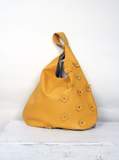 Soft Leather Bag - handbag made of Italian leather. The hobo bag can be carried as a shoulder bag. The spacious interior provides space for all everyday things and more. This bag is perfect as an everyday bag that can fit your iPad, A4 files, books, magazines, cosmetics as well as many accessories. -Yellow leather hippie bag . -Cowchide leather. - Inner pocket with zipper - Magnet closure bag DIMENSIONS: Height from top of handle to base: 66cm (26inches) Width at its widest point: 49cm (19.2inch Simple Leather Bag, Yellow Shoulder Bag, Shoping Bag, Yellow Purse, Soft Leather Purse, Yellow Purses, Large Leather Bag, Leather Bag Pattern, Soft Leather Bag