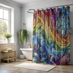 a colorful shower curtain in a bathroom with a tub and window sill on the side