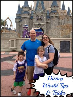 a family poses in front of the disney world tips and tricks sign