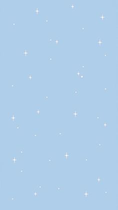 an airplane flying in the sky with white stars