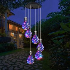 a group of lights that are hanging in the air