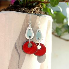 These red hoop earrings are very pretty, soft and delicate. *DETAILS: - All my ceramic pieces are painted by hand with a brush and ceramic glazes, then I put the pieces in a ceramic kiln where they are fired for several hours over low heat so that they stay perfect. * MEASURES Ceramic piece 3,7 cm (1.29)'' x 1,8 cm (0.71'') x 0,2 cm (0.1'') Total drop length 4,8 cm. (1.89'') *MATERIALS: High quality materials. Hypoallergenic. I use black clay and nontoxic ceramic glazes. Each piece is hand paint Red Dangle Earrings For Everyday, Red Dangle Earrings For Everyday Wear, Everyday Red Dangle Earrings, Red Hoop Earrings, Handmade Hoop Earrings, Red Ceramic, Ceramic Earrings, Earrings Teardrop, Dangle Hoop Earrings