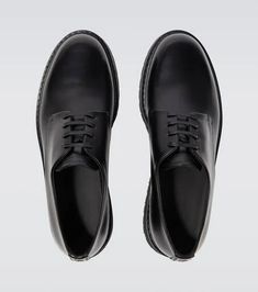 Giorgio Armani elevates these Derby shoes with a distinct platform rubber sole. Made in Italy from black leather, the lace-up style has a rounded toe and logo lettering on the tongue..Sole: leather insole, rubber sole.Toe shape: round toe.Upper: leather.Comes with a box, Comes with dust bag.Designer color name: Nero.Closure: lace-up.Made in Italy.True to size.Half sizes please take the next size up.UK sizes.5,0cm-2' heel (size EU 42) Platform Lace-up Shoes With Round Toe For Derby, Classic Leather Shoes With Platform And Round Toe, Classic Oxfords With Platform And Round Toe, Classic Platform Oxfords With Round Toe, Classic Round Toe Platform Oxfords, Black Platform Lace-up Shoes For Formal Occasions, Classic Leather Platform Oxfords, Formal Platform Oxfords With Round Toe, Leather Platform Oxfords For Derby