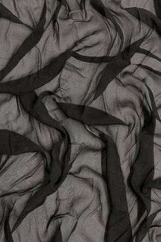 Black Silk Heavy Crinkled Chiffon HCD-054 Fabric is 100% silk fabric with a pronounced crinkled texture. The word "chiffon" is French in origin and means "cloth". Our Silk Crinkled Chiffon comes in a wide range of colors, and it is utilized for bridal, eveningwear, overlays, lingerie, pants, blouses. Purchase Black Silk Heavy Crinkled Chiffon HCD-054 Fabric by the Yard at NY Designer Fabrics. The fabric measures 54 inches in width. Silk Overlay, Sheer Fabric, Red Silk, Sheer Fabrics, Black Silk, Fabric By The Yard, Black Fabric, Silk Fabric, Evening Wear