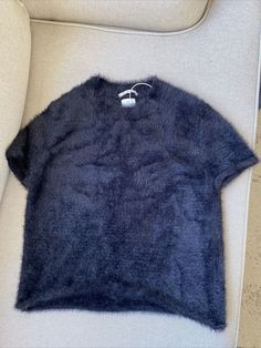 New Zara Girls Black Fuzzy Soft Fancy Collection Knit Sweater Shirt 11-12 Years. Shipped with USPS Mail. SMOKE AND PET FREE HOME Trendy Zara Crew Neck Sweater, Black Knit Crew Neck Top, Zara Crew Neck Tops For Winter, Zara Knit Short Sleeve Tops, Zara Knit Tops Short Sleeve, Zara Girl, Zara Kids, Girls Black, Knit Sweater