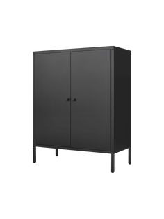 a black cabinet sitting on top of a white wall