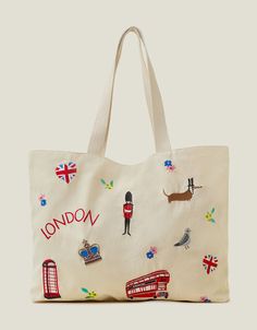 Bright lights, big city. Extra roomy for all your essentials, it's built in cotton canvas with long shoulder straps for comfort. Cross Stitch Tote Bag, Uniqlo Bag, Bright Lights Big City, Embroidered Items, Bag Embroidery, Uniqlo Bags, Pearl Bridal Jewelry, Kit Bag, Wedding Bridal Jewellery