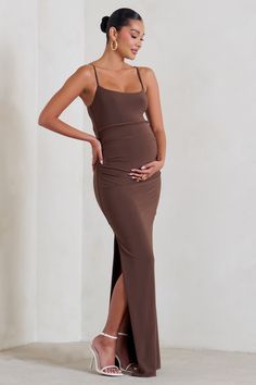 We believe the best time to showcase your body is when you're expecting and our latest maternity dress Aurelia is a fine way to do so. Designed in sculpting stretch jersey. this chocolate brown bodycon features slim cami straps and a split to the side of its full-length skirt.Features- Premium stretch jersey- Adjustable cami straps- Bump ruching- Invisible zip closure- Split hem- Maxi lengthSizing & FitModel is 5'8.5 and wears UK size 8 / US size 4Product InformationDesigned exclusively by Club Brown Maternity Dress, Latest Maternity Dresses, Maternity Photoshoot Outfits, Dress With Split, Cami Maxi Dress, Black Dress Prom, Full Length Skirts, Glamorous Dresses, Sequin Maxi Dress