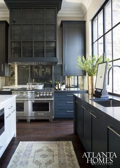 the kitchen is clean and ready to be used by someone who likes it on their phone