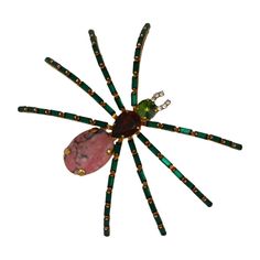 Large and imposing spider brooch of colored pastes with a rhodochrosite body. Emerald baguettes form the curved legs with a peridot paste head and faux ruby pear shaped body. Excellent quality made in Germany 1980's. 4" x 5" x 1" Scary Spider, Glass Spider, Spider Brooch, Spider Costume, Bug Jewelry, 80s Jewelry, Levitation Photography, Spiders Scary, Vintage Spider