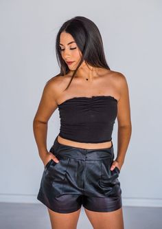 *ALL STEALS AND DEALS ARE FINAL SALE- No Returns or Exchanges This basic white tie top is smocked and great for layering! Paired here under our 'Think You're Slick Jacket' + 'Next Level Shorts.' Black Tube Top Smocked Jimena is wearing the Small. This top runs true to size. Chic Fall Tube Top, Fall Tube Top For Night Out, Casual Spring Tube Top For Date Night, Casual Tube Top For Date Night In Spring, Solid Ruched Tops For Night Out, Versatile Stretch Tops For Date Night, Casual Cropped Tube Top For Night Out, Solid Cropped Tops For Night Out, Solid Stretch Top For Date Night