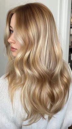 Illuminate your style with Honey Dirty Blonde, a warm and inviting shade that adds a touch of sweetness to your hair. This gorgeous hue features rich golden undertones, perfect for creating a sun-kissed effect. Click the pin for more inspiration and follow us for the latest hair trends! #HoneyDirtyBlonde #HairColor #HairInspo #BlondeHair #HairstyleIdeas Old Money Honey Blonde, Highlights On Golden Blonde Hair, Honey Dark Blonde Hair, Golden Honey Blonde Hair Caramel, Strawberry Beige Blonde Hair, Warm Honey Blonde Highlights, Warm Golden Blonde Hair, Light Honey Blonde, Dirty Blonde Hair Ideas