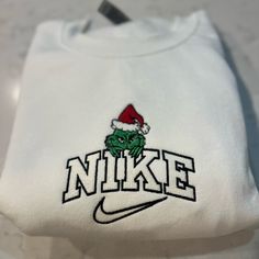 Not Nike Brand Please Allow Up To A Week To Ship Design Size Is 7x5 -Unisex Sizing True To Fit -Embroidered Design -Use Gildan Brand For Crewnecks, However There May Be A Substitute For A Similar Brand -Available In S, M, L, Xl, 2xl Size Of Design Is The Same For All Sizes Of Crewnecks So Design Will Look Smaller On A 2xl Compared To A S Material Is 50/50 Cotton/Polyester *Colors May Vary Slightly* Custom Nike Hoodie, Grinch Sweatshirt, Green Cropped Hoodie, Black Crop Sweatshirt, Oversized Long Sleeve Shirt, Gap Sweatshirt, North Face Pullover, Ship Design, Embroidered Nike