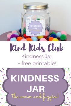 a jar filled with colorful candies next to a sign that says kind kids club