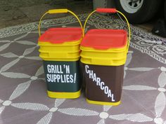 two buckets that say grill'n supplies on them