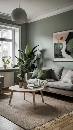 a living room filled with furniture and plants