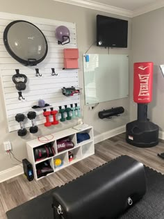 Use a slat wall to organize your workout room, while getting your weights and other equipment on the wall. 

#homedesign #workout #workoutideas #workoutroom #organization #homeinterior #homeworkout #homeinspo #ad Fitness Storage Home Gyms, Workout Area In Small Space Basement, Gym Room Inspiration, Workout Set Up At Home, Mini At Home Gym, Compact Gym Small Spaces, Small Garage Workout Space, Home Gym Setup Small Spaces, Workout Garage Ideas