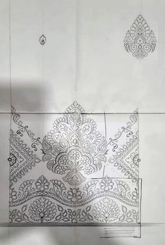 an intricately designed piece of paper is shown