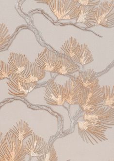 an image of a wallpaper with gold flowers on it's side and branches