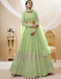 🍀👗✨ Step into style with this pista georgette Lehenga Choli! Effortlessly chic and perfect for any occasion! 😍💃 #ArabicAttire #PistaPerfection #LehengaLove #Fashionista #ChicAndStylish #GlamorousVibes #DressToImpress 👑🌟🛍️ Pista Colour, Pista Green Colour, Sequin Lehenga, Green Lehenga Choli, Engagement Lehenga, Bridesmaid Lehenga, Sangeet Outfit, Pista Green, Georgette Lehenga