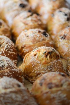 freshly baked pastries are lined up on a tray