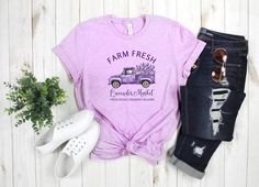 Farm Fresh Lavender T-shirt :)  This lovely shirt features a detailed lavender farms truck design. This design features a cute watercolor truck filled with lavender blooms, cursive font and other small lovely details. The blooms and truck were hand-painted with watercolors and then further re-size and digitally enhanced for printing while still maintaining the softness of watercolors.  This is a cute and a unique lavender shirt making it perfect for your spring wardrobe. The design is printed on a light weight bella canvas shirt. Available in several colors. Blessings! :)  * 100% combed and ring-spun cotton (Heather colors contain polyester) * Fabric weight: 4.2 oz/yd² (142 g/m²) * Pre-shrunk fabric * Side-seamed construction * Shoulder-to-shoulder taping Lavender Cotton Summer Shirt, Lavender Cotton Shirt For Summer, Lavender Short Sleeve Shirt For Summer, Lavender Short Sleeve T-shirt For Summer, Lavender Graphic Tee With Relaxed Fit, Lavender Relaxed Fit Graphic Tee, Lavender Relaxed Fit T-shirt For Spring, Lavender Graphic Cotton Tee, Lavender Graphic Tee In Cotton