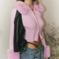 The Updated Version Of The Waterloo Peggy Cardigan From House Of Sunny Is Made With A Pink Ribbed Knit, And Is Adorned With A Detachable Faux-Fur Collar And Cuffs For A Touch Of Luxe. It Features A Slim Fit, Long Sleeves, A Round Neck, A Double Sided Zip Closure, A Cropped Cut, And A Metal Brand Plaque On The Bottom Left. Condition: Very Good; Light Snagging. Size: 4 Approximate Measurements: Shoulder: 16" (40.5 Cm) Chest: 15.5" (39 Cm) Length From Back: 16" (40.5 Cm) Sleeve Length (Without Fur, Pink Fur Cardigan, Pink Era, Pink Edit, Faux Fur Cardigan, Fur Top, Fur Cardigan, House Of Sunny, Chic Aesthetic, Fitted Cardigan