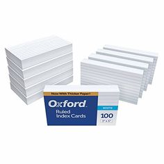 six white folded index cards on a white background