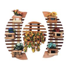 three wooden shelves with plants and flowers on them