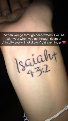 a person with a tattoo on their arm that says, when you go through deep waters, i will be with you