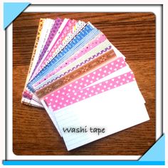 washi tape stacked on top of each other in different colors and patterns, with the words washi tape written below it