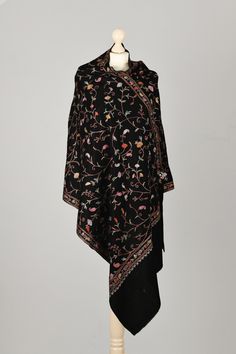 Black super soft wool Scarf, embroidered with Orange and Rose with small pieces of Red velvet fabric in traditional Kashmiri Floral design with Silk viscose yarn.   Highlights *Handmade in Kashmir  *Materials: Super Soft lightweight Wool, Embroided with Silk and viscose  *Length: 200 cm  *Width: 70 cm  Description Elegant and authentic Kashmiri scarf in Super Soft wool embroidered with Orange and Rose with small pieces of Red velvet fabrics with Silk viscose yarn.  Extremely comfortable to wear. Perfect for everyday or formal use.  This scarf is produced in a small family-owned business for the past five generations.  The colors of the shawls may differ slightly from those shown in the photos due to the light conditions and monitor calibration. Washing Instructions: Dry clean only. Please Traditional Floral Design, Red Velvet Fabric, Embroidery Traditional, Abstract Embroidery, Scarf Handmade, Rose Embroidery, Personalized Embroidery, Floral Scarf, Formal Attire