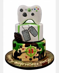 a birthday cake made to look like a video game controller