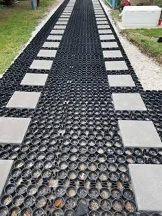 a long walkway made out of metal grates