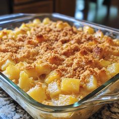 a casserole dish filled with food on top of a table