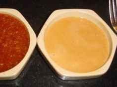 two bowls filled with different types of food