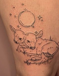 a couple of animals that are on the side of a woman's thigh,