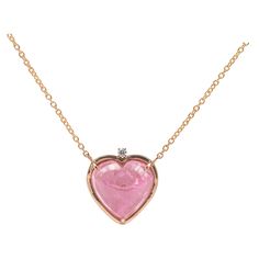 Rossella Ugolini "Open your heart" Collection 18 Karat Yellow Gold Heart Cut Pink Tourmaline White Diamond Pendant Necklace The perfect gift for a special day, this is a gift she will remember forever and never take off. A timeless pink heart pendant necklace handcrafted in 18 karats yellow gold and adorned with pink tourmaline and a white diamond. This piece is entirely manufactured, in an artisanal way, in Rome, Italy and every step of the process is carefully executed. The yellow gold chain g Pink Gemstone Heart Necklace, Pink Heart Beads Necklace For Anniversary, Heart Beads Necklaces For Valentine's Day Keepsake, Pink Heart Necklace For Gift, Heart Cut Keepsake Necklace For Valentine's Day, Valentine's Day Heart Beaded Necklace Keepsake, Valentine's Day Heart Beads Necklace Keepsake, Valentine's Day Keepsake Necklace With Heart Beads, Pink Heart Pendant Jewelry For Keepsake