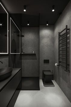 a black and white photo of a modern bathroom