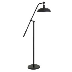 a black lamp on a white background with the light turned on and one arm extended