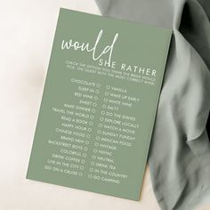 a green and white wedding seating card with the word wow ly written on it