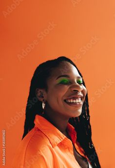 Stock Image: Cheerful african woman with makeup and face piercings smiling in a studio Unique Headshots, Artist Headshots, Campaign Materials, Female Headshots, Weird Beauty, Professional Headshots Women, Headshot Ideas, Bold Women, Headshot Poses