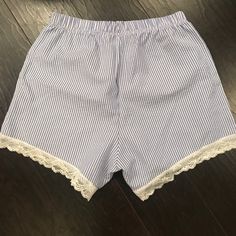 Seersucker And Lace Pajama Shorts. Size Small. Super Cute, Never Worn. Striped Summer Bottoms For Daywear, Summer Seersucker Bottoms For Vacation, Striped Bottoms For Summer Pajama Party, Summer Blue Bloomers With Elastic Waistband, Summer Seersucker Beach Shorts, Summer Beach Seersucker Bottoms, White Cotton Shorts For Pajama Party, Striped Pajama Shorts For Summer Pajama Party, Striped Cotton Bottoms For Pajama Party