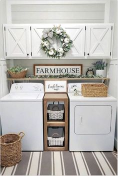 a white washer and dryer sitting inside of a laundry room