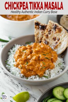 chicken tika masala with white rice and cucumber slices on the side