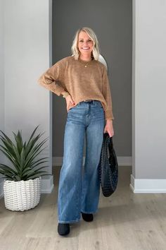 A cozy sweater styled with wide-leg jeans! Sweater, wide leg jeans and boots outfit idea for winter. Cozy Sweater, Boots Outfit, Cozy Sweaters, Sweater Fashion