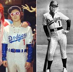 two men dressed in baseball uniforms and one is wearing red hair, the other wears white