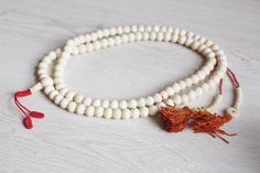 Handmade pure Buffalo Bone beads white . 10mm beads 108 beads Mala Necklace DIY jewellery making #DIY #Jewellery Making #Jewellery Supplies #handmade #vintage Beads #Fairtrade #Buddha #Meditation #Yoga #Necklace #Bulk Supplies White Bohemian Beads For Gifts, Bohemian White Beads As A Gift, Bohemian White Beads For Gifts, White Jewelry With Wooden Beads, White Jewelry With Round Wooden Beads, Hand-strung White Round Bead Necklaces, White Hand-strung Round Bead Necklaces, White Spiritual Jewelry With Wooden Beads, Spiritual White Jewelry With Wooden Beads