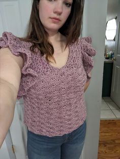 This blouse is 100% handmade with acrylic yarn. It has open, flared sleeves for extra comfort (Size Large) Pattern by:ShopDaisyAndDime Bohemian Knit V-neck Top, Handmade Knit Tops For Spring, Lacey Blouse, Womens Blouses, Grand Rapids Mi, Grand Rapids, Flared Sleeves, Acrylic Yarn, Womens Clothing Tops